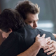 Nick Zano and Brandon Routh hugging on DC's Legends of Tomorrow.